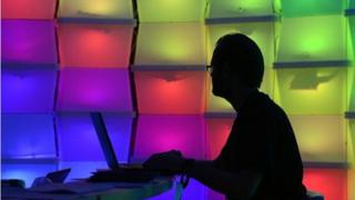 Anonymous man on laptop