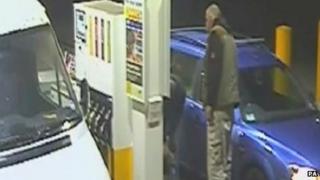 A jury was shown footage of two men at a petrol station