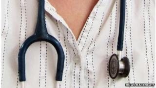 Stethoscope round a doctor's neck