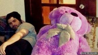 Hunter Moore with a teddy bear