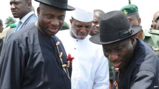 Rivers state governor Rotimi Amaechi (L) and President Goodluck Jonathan (R)