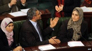 Tunisian President of the Ennahda parliamentary group, Sahbi Atig (2nd L) speaks with Ennahdha MPs during a meeting at the National Constituent Assembly (NCA) as part of the debates on a new constitution on January 23, 2014, in Tunis.