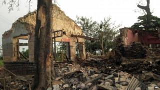 View of a house destroyed at the Camp Brigade after an explosion at an arms depot in Mbuji-Mayi, the central Democratic Republic of Congo, on 25 January 2014