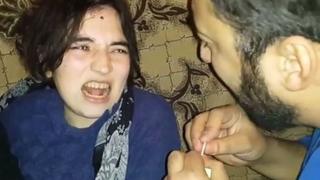 A screengrab of an online video showing an alleged 'exorcism'