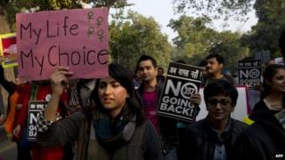 Members and supporters of the lesbian, gay, bisexual, transgender community attend a rally on India's 65th Republic Day in Delhi on January 26, 2014