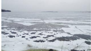 The view across the frozen Dnieper river, while entering Zaporizhya on a particularly cold, bleak day.