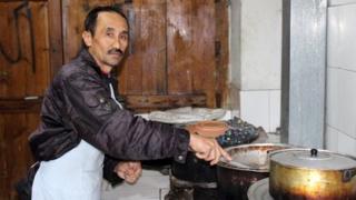 Ibrahim, the chef at Kabul's popular 'Sufi' restaurant at work in the kitchen