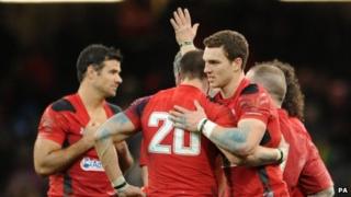 Players embrace after their first Six Nations' victory of 2014