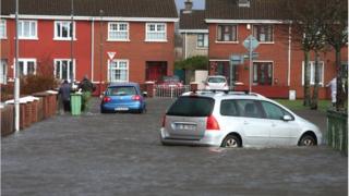 Cars in flood water after a flash flood on the Lee Estate in Limerick City