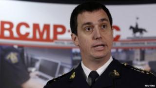 Royal Canadian Mounted Police (RCMP) Assistant Commissioner Gilles Michaud delivers a statement in Ottawa 4 February 2014
