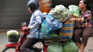File image of heavily loaded motorbike in Phnom Penh
