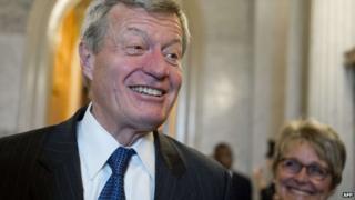 US Democratic Senator Max Baucus of Montana speaks with reporters alongside his wife, Melodee Hanes (right), after being confirmed by the US Senate as the next US Ambassador to China at the US Capitol in Washington, DC, 6 February 2014