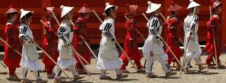 Japanese pupils carrying out a traditional ceremony in Osaka