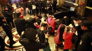 Police have arrested several people from hotels in Dongguan, reports say