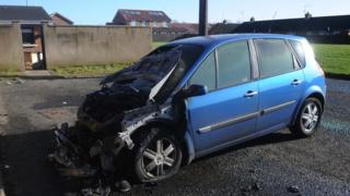 The remains of the burnt out car in the Kilwilkie estate