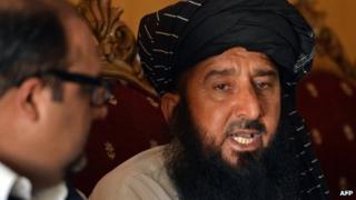 In this photograph taken on June 6, 2013, Pakistani tribesman Kareem Khan (R), the victim of a US drone attack, speaks to media during a press conference in Islamabad.