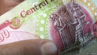 An Iraqi dinar note