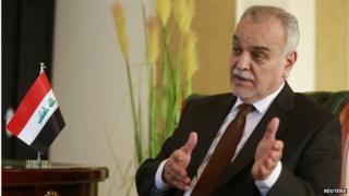 Iraq's former Vice President Tariq al-Hashemi gestures during a different interview in Doha on 26 January