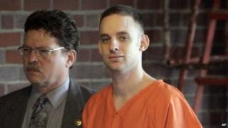 Former 101st Airborne Division Pfc Steven Dale Green is escorted to the courthouse on the third day of his trial 29 April 2009