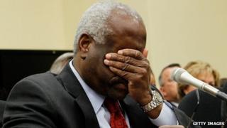 Clarence Thomas rubs his eyes during a congressional budget hearing in April 2010.