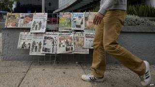 View of the covers of Mexican newspapers in Mexico City on 23 February, 2014