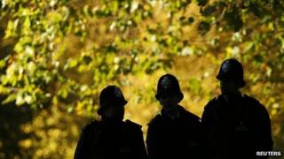 Silhouette of police officers