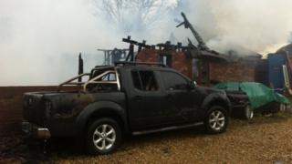 Bungalow and vehicle damaged by fire