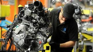 A Nissan employee works on the second generation Qashqai, at the Nissan plant in Sunderland