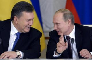 Ukrainian President Viktor Yanukovych (left) with his Russian counterpart, Vladimir Putin, in Moscow, 17 December