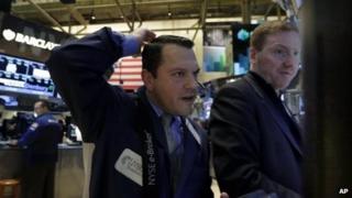 Market traders at the New York Stock Exchange