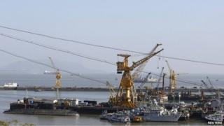 Ships and submarines belonging to the Indian Navy are seen docked at the naval dockyard in Mumbai February 27, 2014.