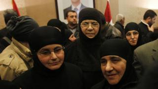 Nuns arrive at the Syrian border with Lebanon at the Jdaydeh Yaboos crossing, early March 10, 2014.