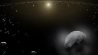 Artist conception of dwarf planet Ceres in the main asteroid belt