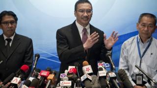 Malaysian officials answer questions during a 13 March, 2014, press conference on the disappearance of flight MH370.