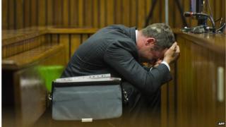 Oscar Pistorius reacts during his murder trial at the North Gauteng High Court in Pretoria, on March 13, 2014