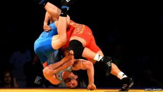 Athletes from the Iran and US team during a match in the Freestyle Wrestling World Cup in Los Angeles