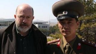 Panorama reporter John Sweeney alongside North Korean official