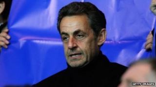 Former French President Nicolas Sarkozy watches a football match in April 2013.