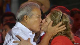 Salvador Sanchez Ceren, the presidential candidate for the Farabundo Marti National Liberation Front (FMLN), kisses his wife Margarita Villalta in San Salvador on 15 March, 2014