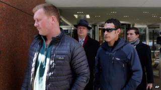 James Brady (left) and Andrew Rossig surrendered to police in New York City on 24 March 2014
