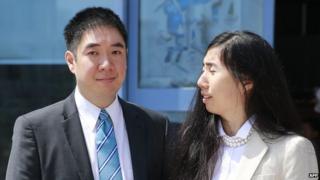 Matthew and Grace Huang outside the court in Doha, Qatar (27 March 2014)