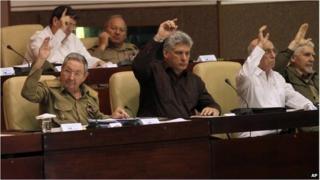 Cuban President, Raul Castro, (first left) and other authorities vote in the National Assembly