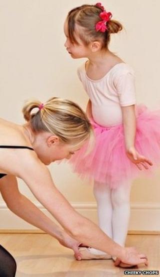 Girl ballerina in pink tutu