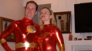 Jake Rush and his wife dressed as Superheroes
