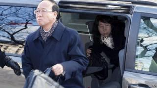 Slain York University student Qian Liu's father Liu Jianhui and mother Zheng Yaru, right, arrive at court in Toronto 24 March 2014