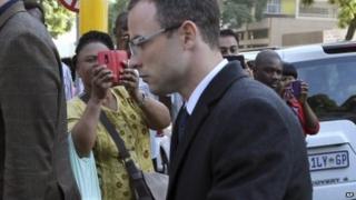 Oscar Pistorius arriving in court on 8 April 2014