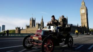 A car drives over Westminster Bridge