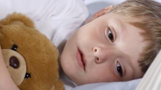 Boy and teddy bear