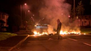 Rubbish on fire at Woodburn Avenue