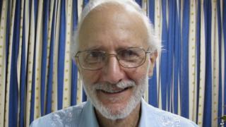 Alan Gross poses for a photo during a visit by Rabbi Elie Abadie as he serves a prison sentence in Havana in November 2012